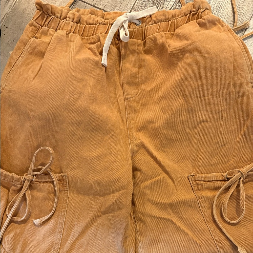Casual Tan Cargo pants with a lot of detail